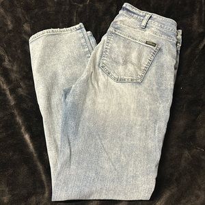 Woman’s silver jeans